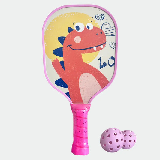 Children's paddle with dinosaur design and pink handle, accompanied by a ball on a white background